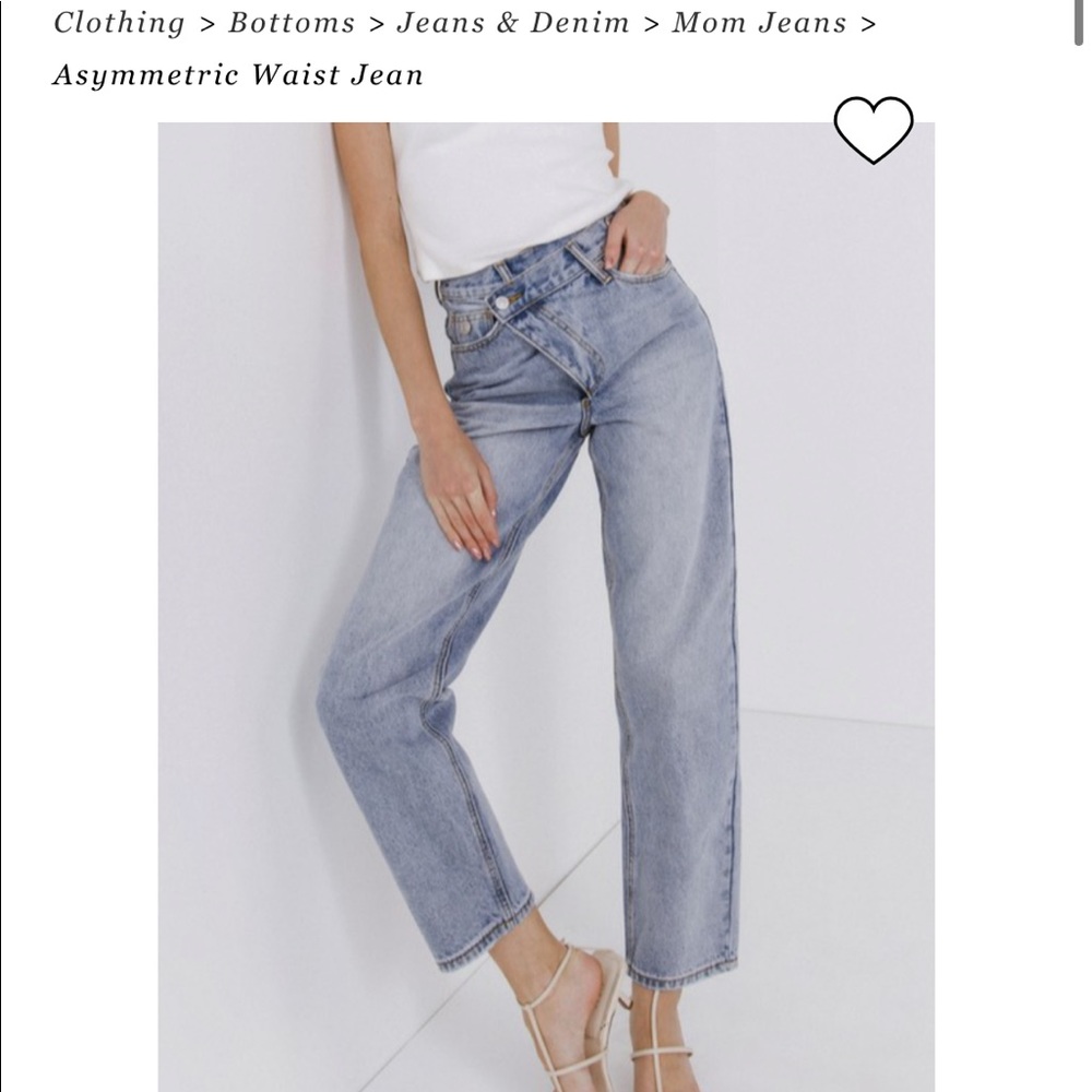 NWT Asymmetrical waist jeans.